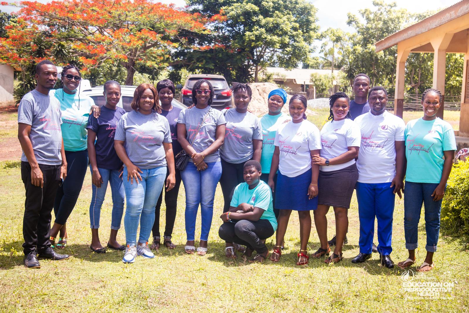 The CHAYIL outreach team standing together in CHAYIL branded T-shirts